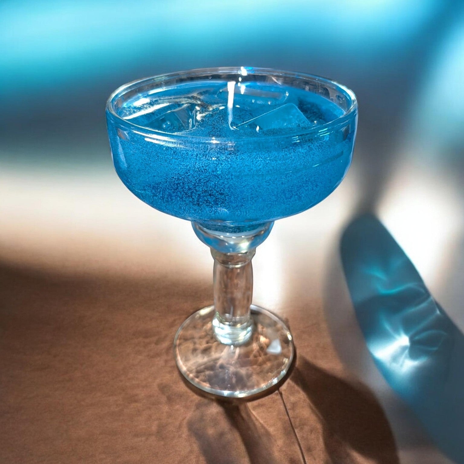 Blue drink-inspired decorative gel candle in stemmed glass by Scents & Gifts