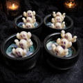 Scents & Gifts Ghost Cauldrons Halloween candle art on dark styled background