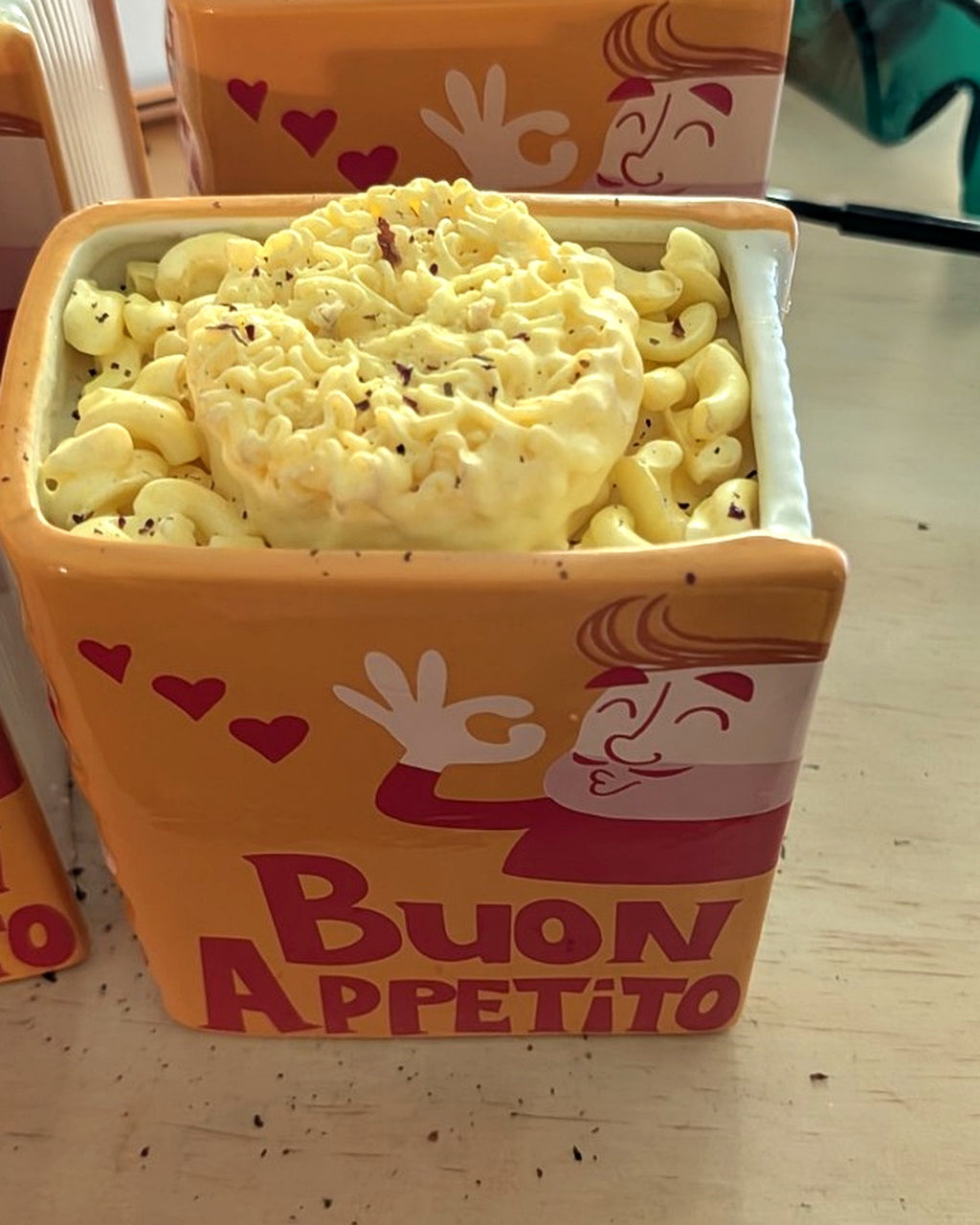 I Love Pasta Candle in orange ceramic Buon Appetito pasta book vessel with realistic pasta wax embeds