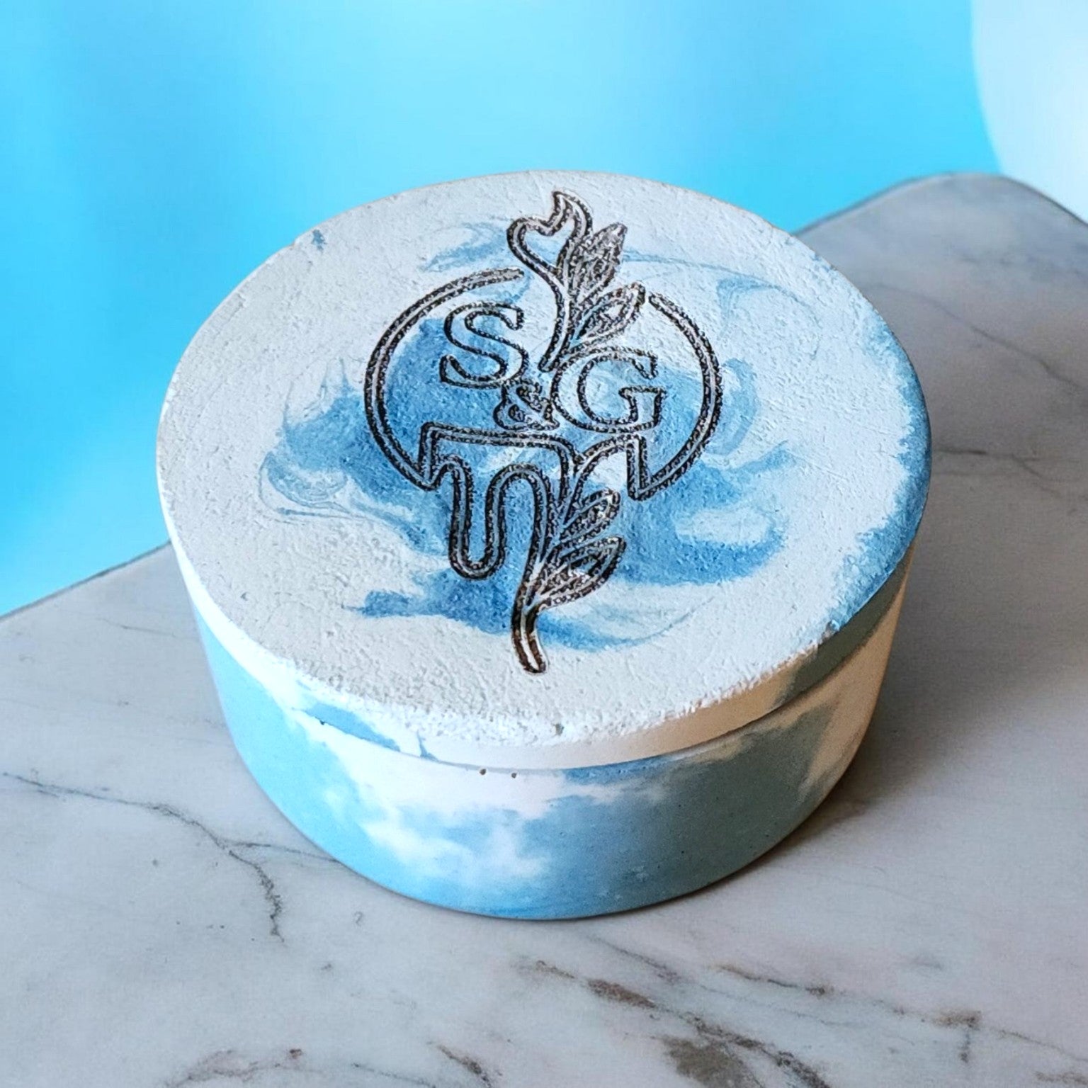 Industrial Serenity blue cement candle with branded lid