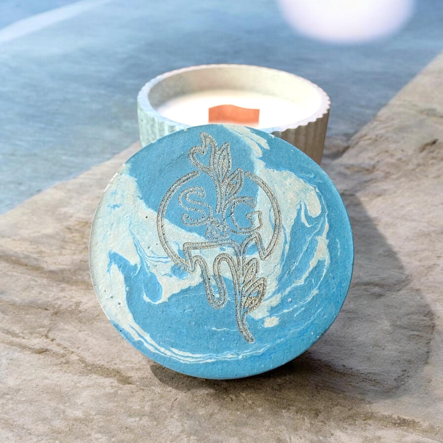 Industrial Serenity reusable cement vessel with Scents & Gifts branded lid